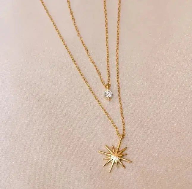 This elegant two-layer necklace features delicate star-shaped zircon inlays that add a touch of sparkle and sophistication to any outfit.