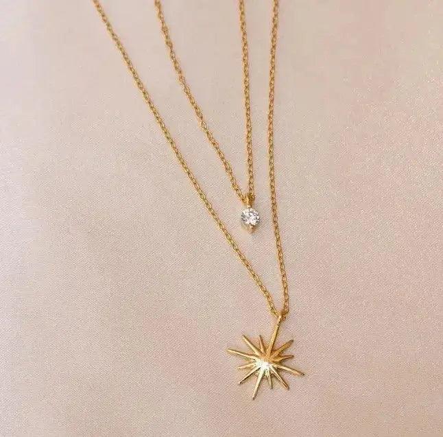 This elegant two-layer necklace features delicate star-shaped zircon inlays that add a touch of sparkle and sophistication to any outfit.