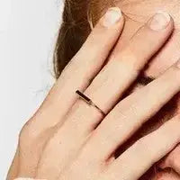 Model showing wearing this ring non-tarnish ring minimalist, stainless steel
