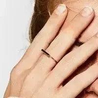Model showing wearing this ring non-tarnish ring minimalist, stainless steel
