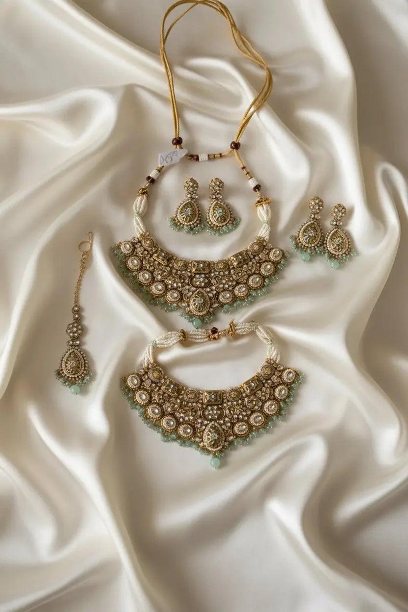 Ravity Kundan Mint & Pearl Heavy Bridal Set with Maang Tikka β Gold Tone Nikhar Jewelry