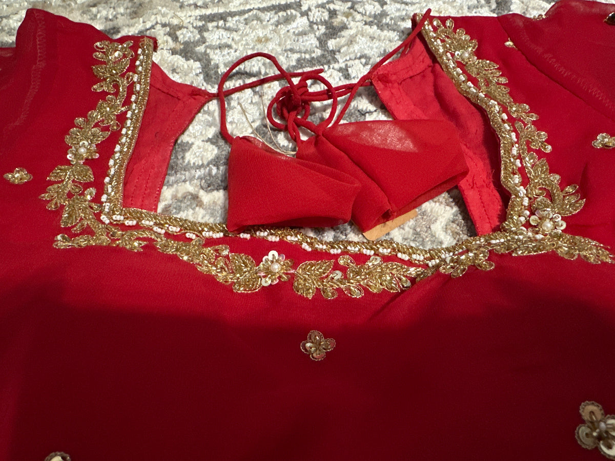 Red Saree with heavy hand work of sequins, pearls, cutdana, dabka work and green stonework Maha Collection