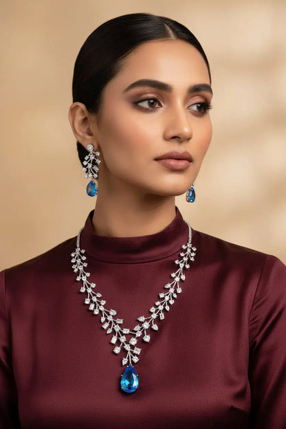 Traditional yet Trendy Design | Ideal for your Parties !statement piece nice leaf design with big earings nice nice light blue doublet with CZ all over - Deepika's Adornments