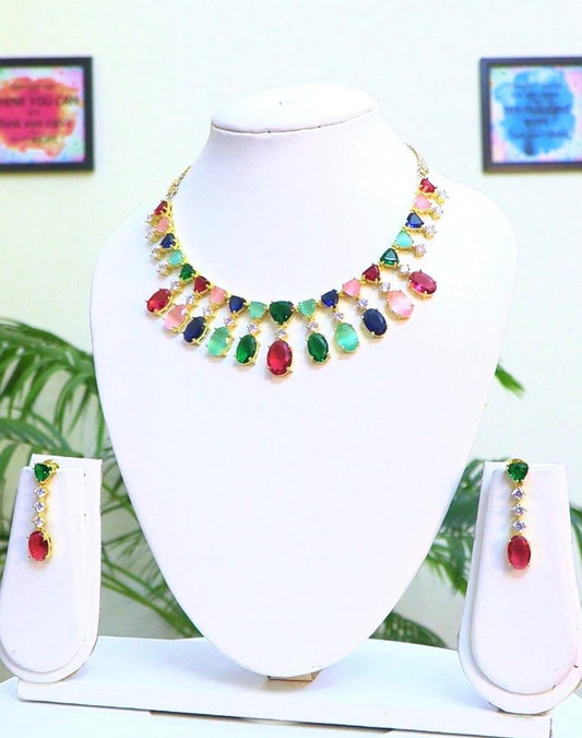 A Classic Cz Set on Fire! It can be worn as choker or necklace. Beautiful combo of multi and gold with premium quality of Cz's