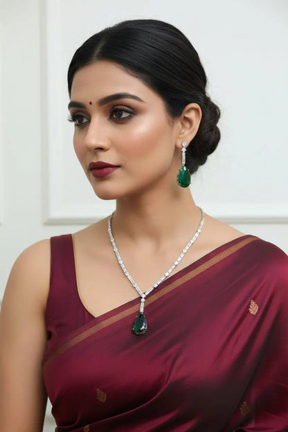 Look Awesome in every Occasion with buggetts all over with large green stone in middle. All in silver, very elegant design - Deepika's Adornments