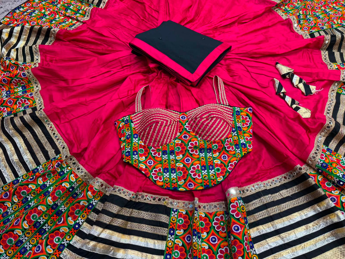 Rani pink Nazakat Chaniya Choli set on mannequin — full view showing Kutchi corset blouse, flared chaniya with multicolour woven border and dupatta