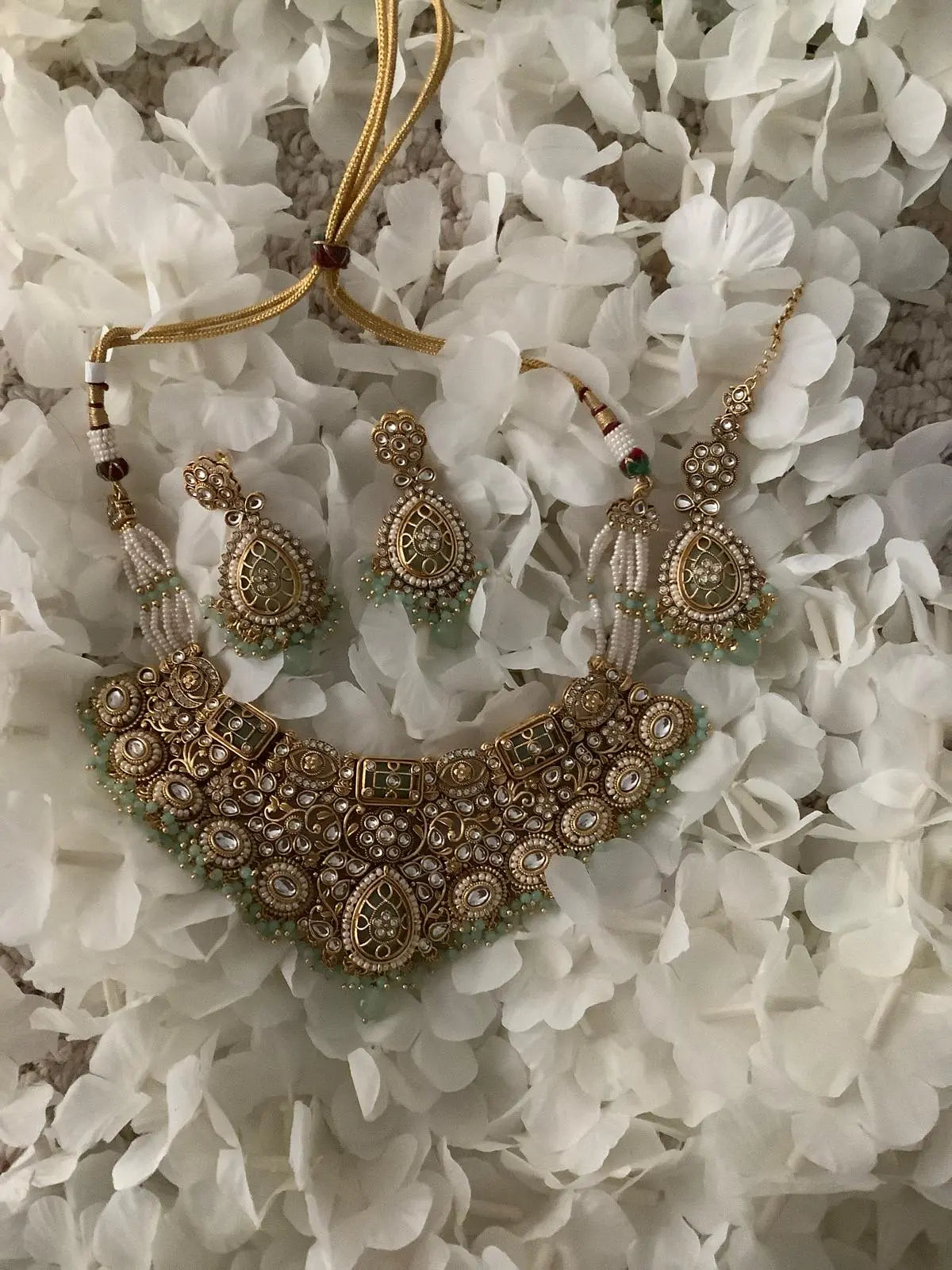 Ravity Kundan Mint & Pearl Heavy Bridal Set with Maang Tikka – Gold Tone Nikhar Jewelry