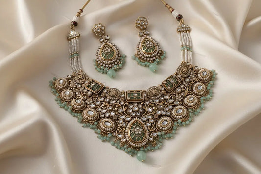 Ravity Kundan Mint & Pearl Heavy Bridal Set with Maang Tikka – Gold Tone Nikhar Jewelry