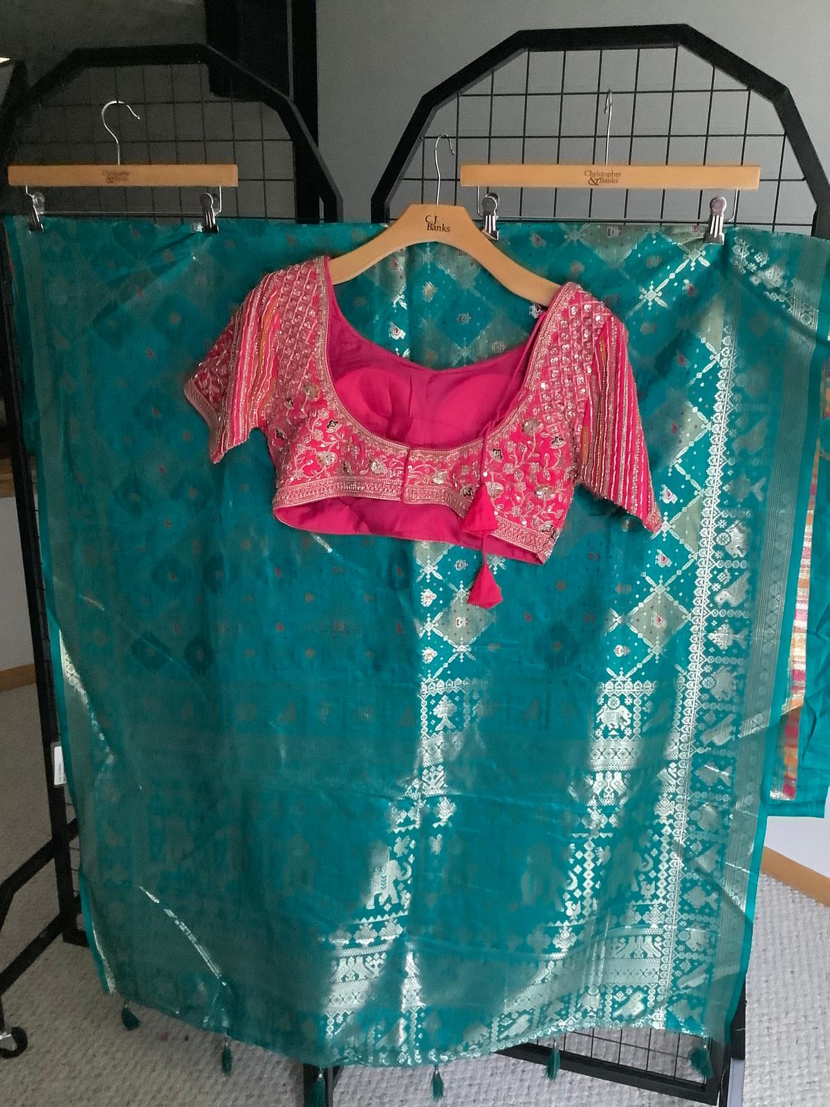 Teal Banarasi Saree with Heavy Embroidered Pink Blouse Ajmera