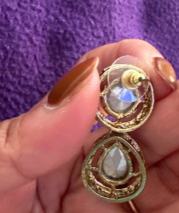 Champagne crystal drop earrings back view showing push back screw closure mechanism on gold-toned base metal setting