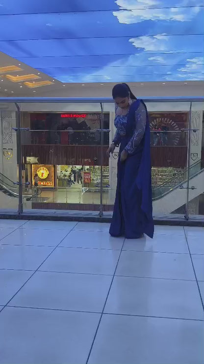 dhoti saree women waking inside the mall